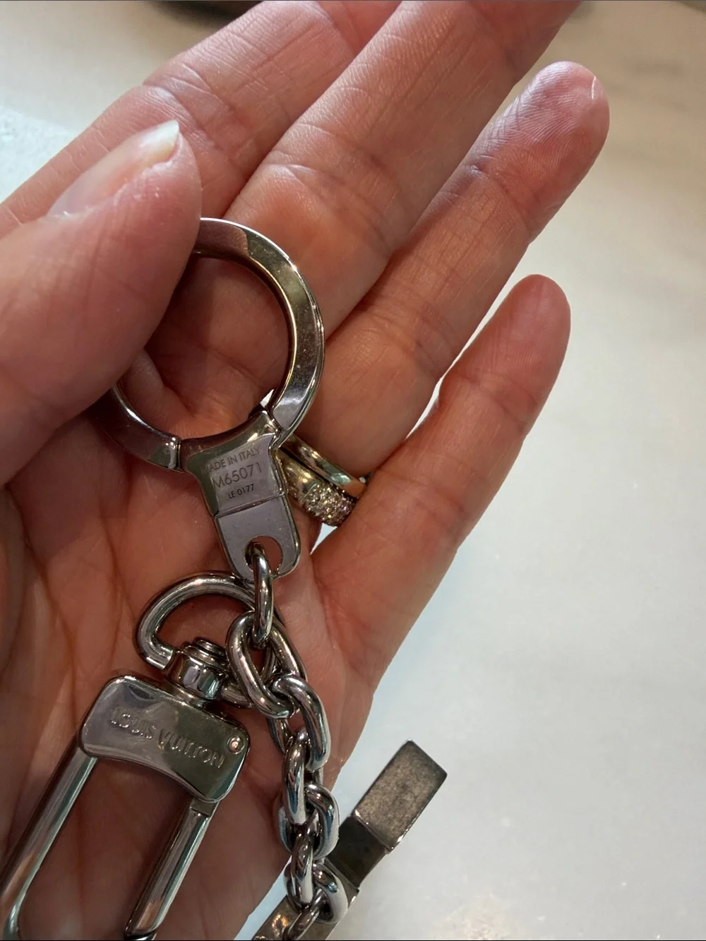 Louis Vuitton Silver LV Logo Keyring